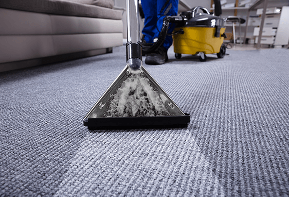 man-wet-vac-floor-cleaning